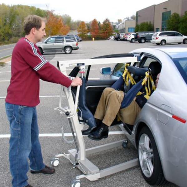 medcare car extractor in use caregiver handicare