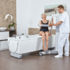 beka eve bath and shower lift patient with caregiver